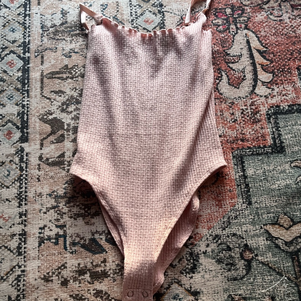 Pink body suit